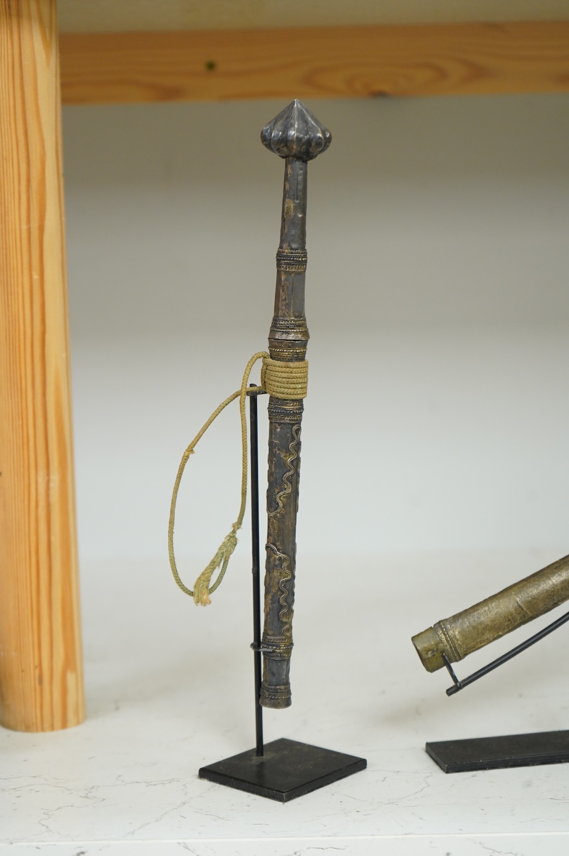 A Burmese dagger dha, blade 14.5cm, hilt and sheath covered in sheet silver filigree decoration, together with an unusual pair of small Burmese knives with silver mounted stag horn handles and silver covered sheath, both